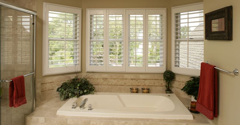 Plantation shutters in Miami bathroom.